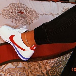 red, blue, and white cortez’s